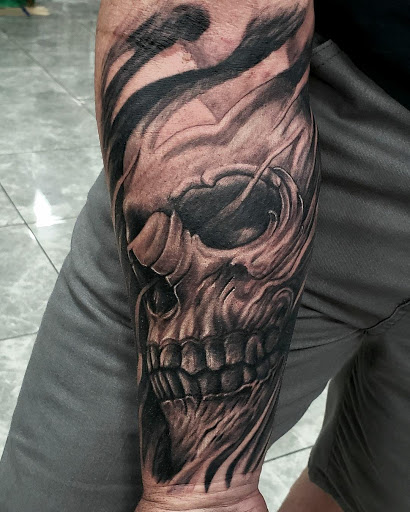 Explore first male tattoo ideas, creative tattoo ideas in Phoenix, available at Grand Avenue Tattoo & Piercings