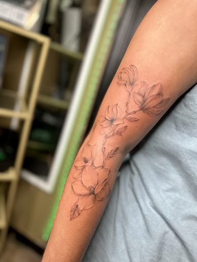 Explore tattoo ideas for a submissive, creative tattoo ideas in Foley, available at Emerald Ink Tattoos by Victoria