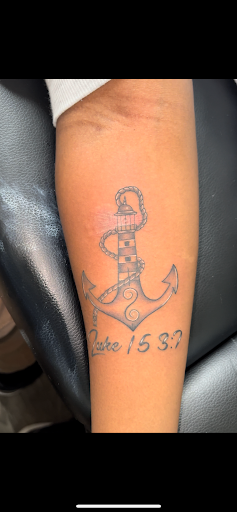 Explore dirtbike tattoo idea, creative tattoo ideas in Newport News, available at Cholo Ink Tattoo Studio