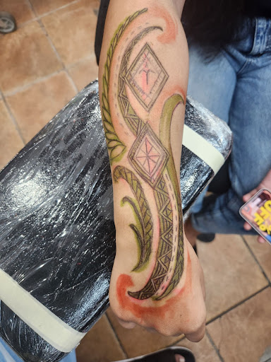 Explore yin yang couple tattoo ideas, creative tattoo ideas in Honolulu, available at Aloha Tattoo Waikiki Hilton Hawaiian Village Rainbow Bazaar