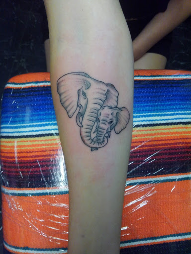 Explore stained glass tattoo ideas, creative tattoo ideas in Pueblo, available at Tortured Souls Tattoo