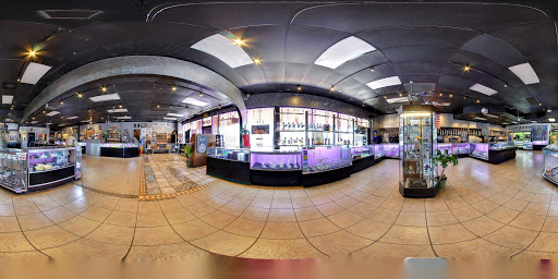 Tattoo Shop «Dungeon Body Piercing & Tattoos», reviews and photos, 10014 University Blvd, Orlando, FL 32817, USA