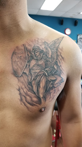 Explore last name tattoo ideas on arm, creative tattoo ideas in Federal Way, available at Jurassic Ink Tattoo Co.