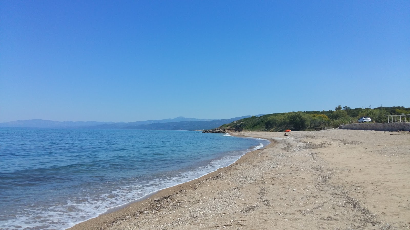 Fotografija Kiparissia III z kevyt hiekka ja kivi površino