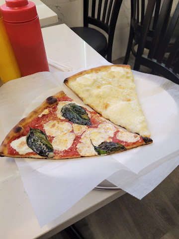 Paulie's Kitchen + Pizza by null