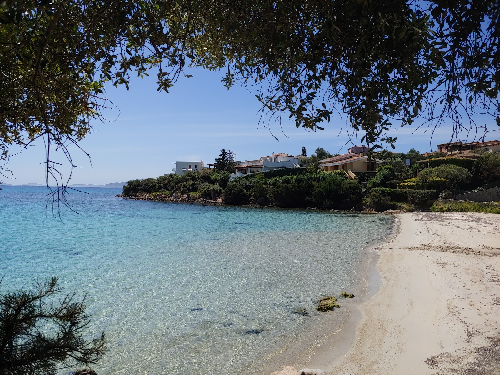 Zdjęcie Quinta Spiaggia z powierzchnią turkusowa czysta woda