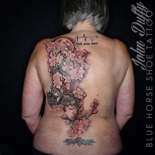Explore cute female tattoo ideas, creative tattoo ideas in Portsmouth, available at World Famous Blue Horseshoe Tattoo and Piercing