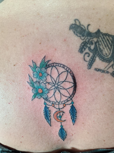 Explore disc golf tattoo ideas, creative tattoo ideas in Rome, available at Artistic Edge Tattoo