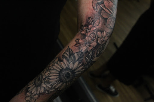 Explore foot tattoo cover up ideas, creative tattoo ideas in Homosassa, available at Citrus Tattoos