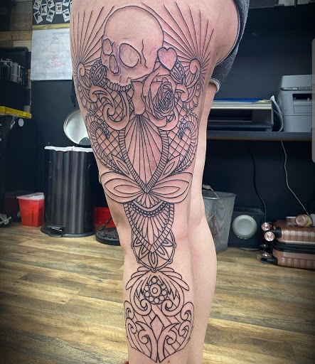 Find tattoo ideas for in between breast for your next unique tattoo in Abington at Tattoo Galaxy (Abington) Piercing and Custom Tattoos