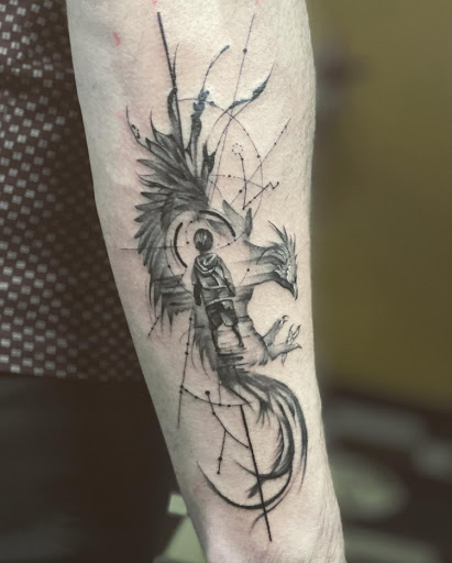 Explore wine tattoo ideas, creative tattoo ideas in Stevens Point, available at Black Rabbit Tattooing