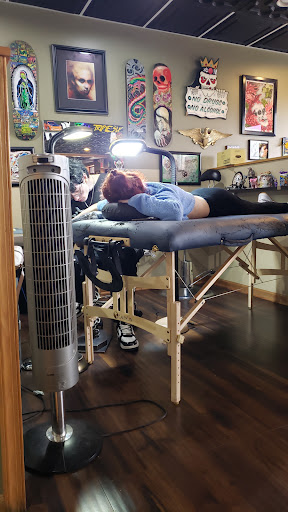 Explore mc escher tattoo ideas, creative tattoo ideas in Joliet, available at Lifestyle Ink Tattoos