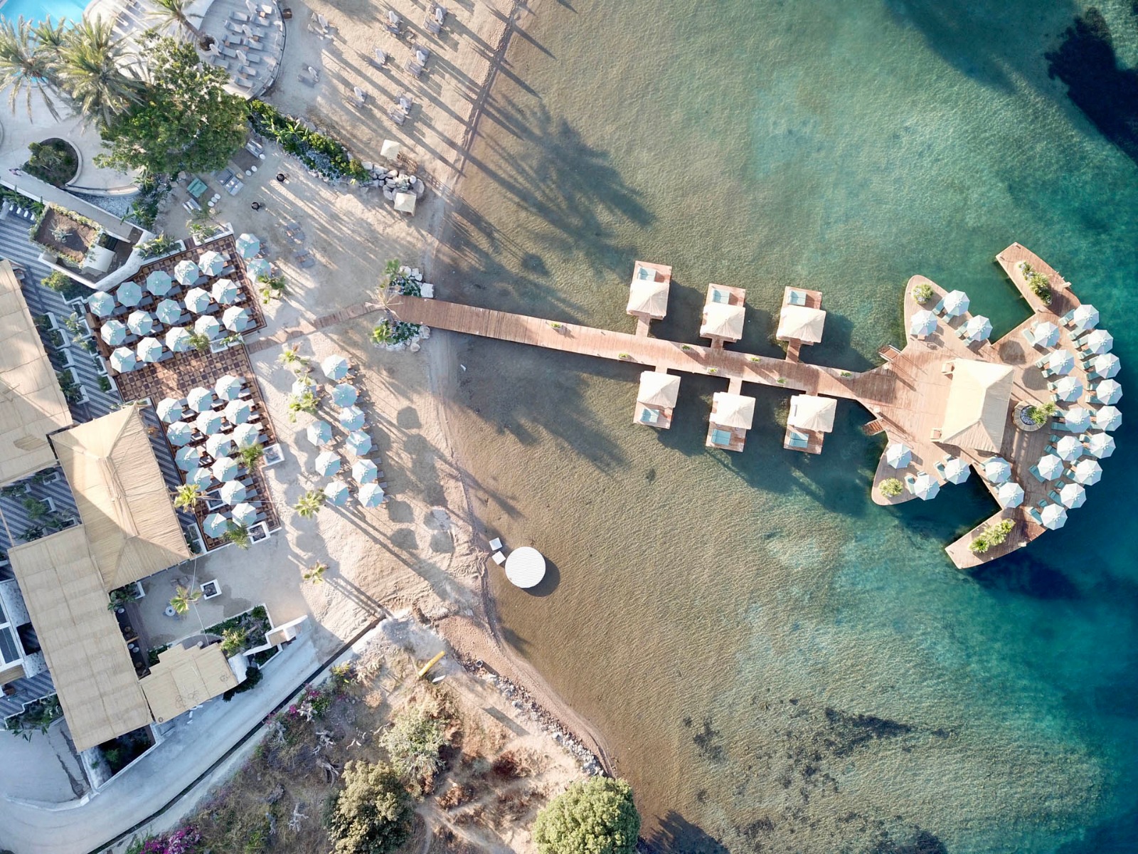 Foto de Playa D'Plaj con arena fina beige superficie