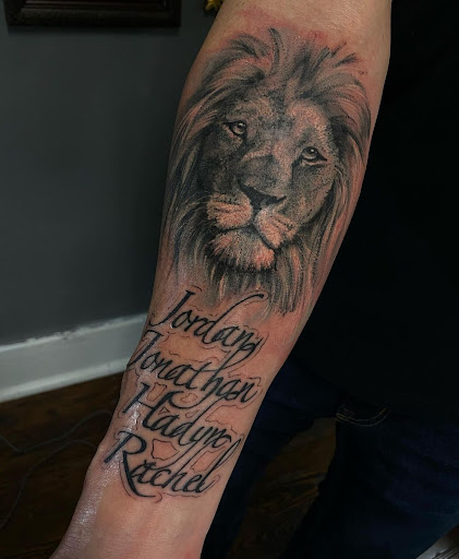 Explore thigh tattoo idea, creative tattoo ideas in Valdosta, available at Acid Ink Tattoos