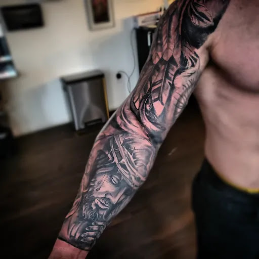 Explore mens armband tattoo ideas, creative tattoo ideas in Medina, available at Greasers Ink