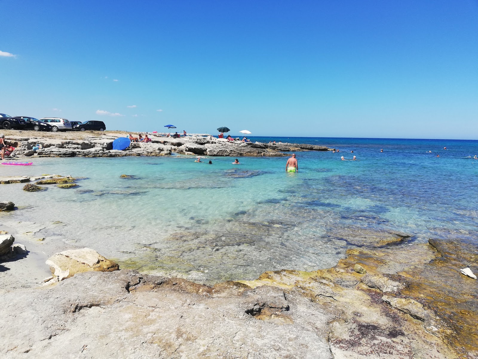 Fotografija Lido Coiba z svetel pesek površino