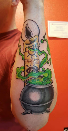 Explore tattoo ideas behind the ear tattoos, creative tattoo ideas in San Angelo, available at Inkland Tattoo Studio