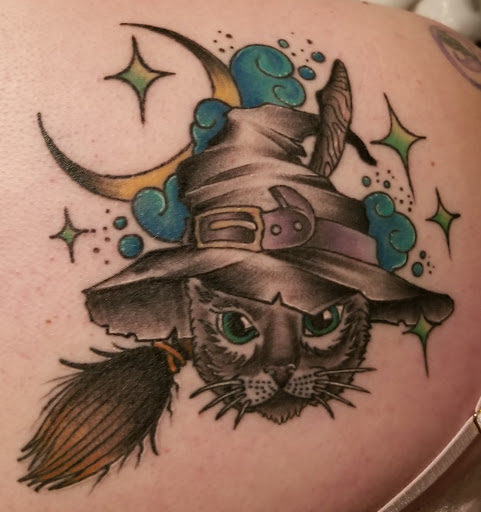 Explore chest piece tattoo ideas for women, creative tattoo ideas in Arlington, available at Urbans Tattoo & Piercing Studio South