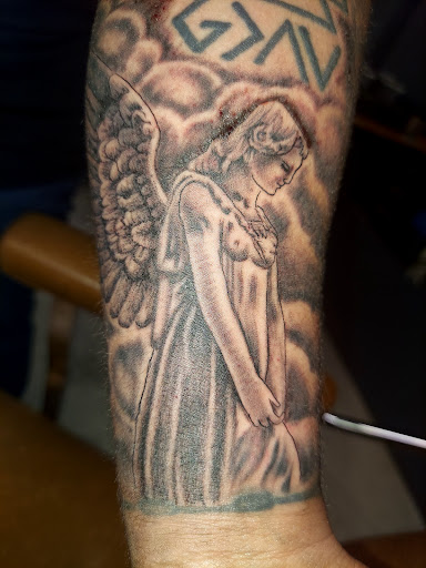 Explore tattoo ideas with roman numerals, creative tattoo ideas in Odessa, available at Little Dragon Tattoos Studio