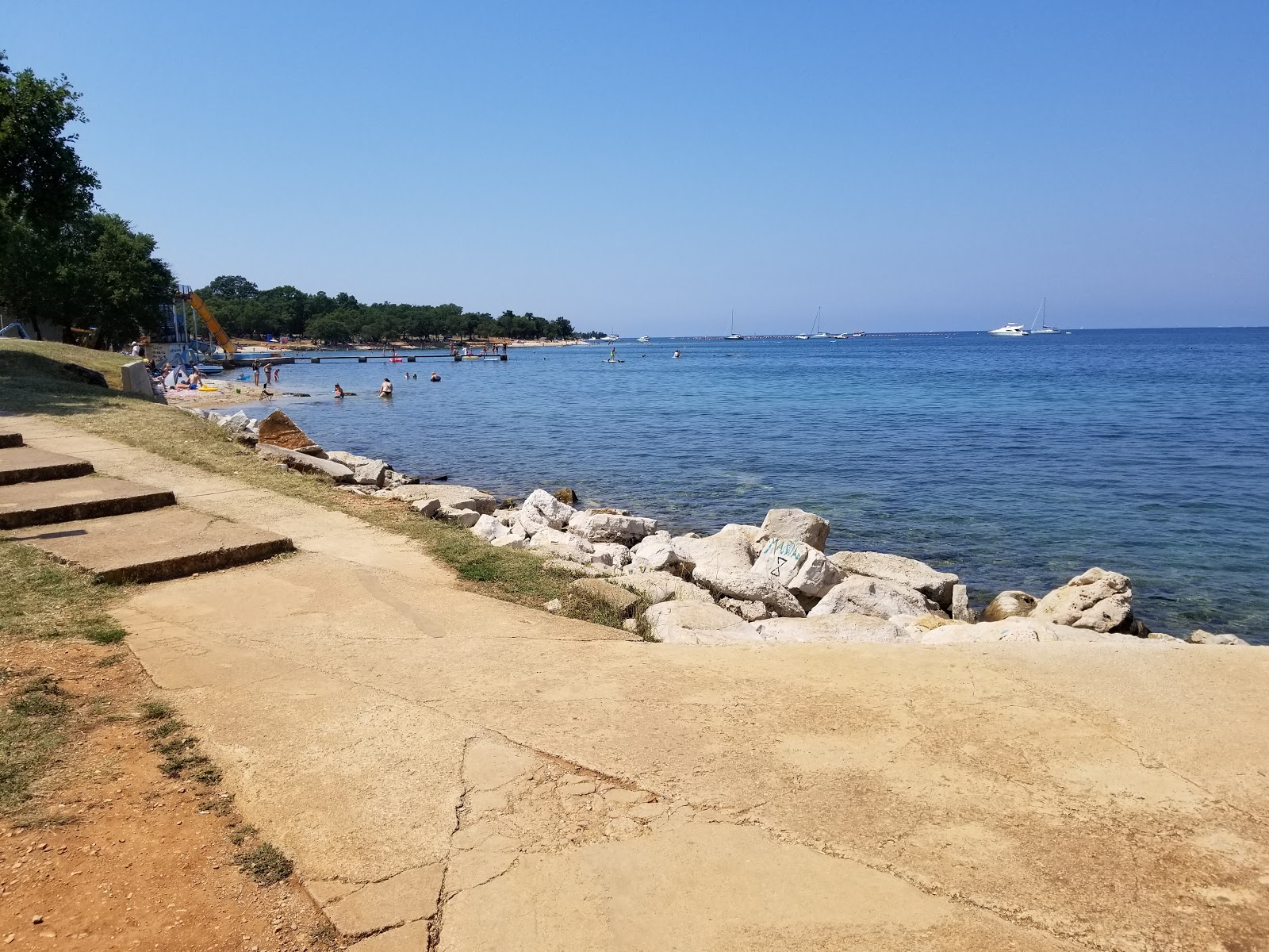 Photo de Porat beach avec plage spacieuse