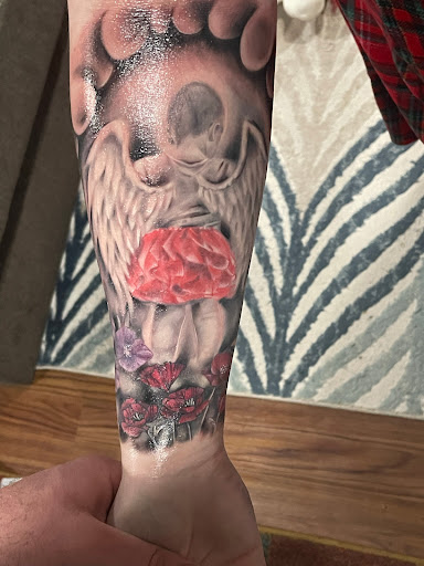 Explore mens leg sleeve tattoo ideas, creative tattoo ideas in Fulton, available at The Kings Head Tattoo Company