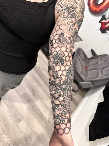 Explore men's dark tattoo ideas, creative tattoo ideas in Selbyville, available at Skin Deep Studios