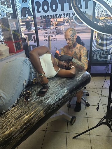 Explore neck tattoo ideas for females, creative tattoo ideas in Spring, available at Late Nite Tattoos