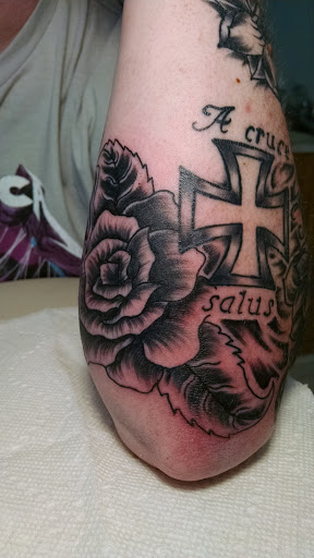 Explore olivia tattoo ideas, creative tattoo ideas in Hanceville, available at Wildman Tattoo and Body Piercing