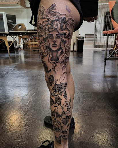 Explore flower name tattoo ideas, creative tattoo ideas in Lewisburg, available at Rose and Dagger Tattoo