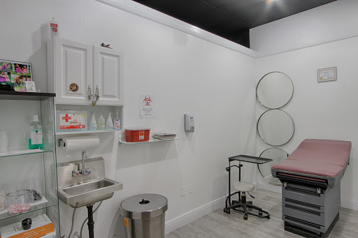 Tattoo Shop «Fallen Sparrow Tattoo Co», reviews and photos, 5049 W Irlo Bronson Memorial Hwy, Kissimmee, FL 34746, USA