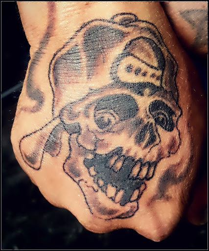 Explore kurt cobain tattoo ideas, creative tattoo ideas in San Angelo, available at Alchemy Tattoo and Piercing Studio