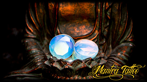 Explore spiritual tattoo ideas for guys, creative tattoo ideas in Denver, available at Mantra Tattoo and Piercing