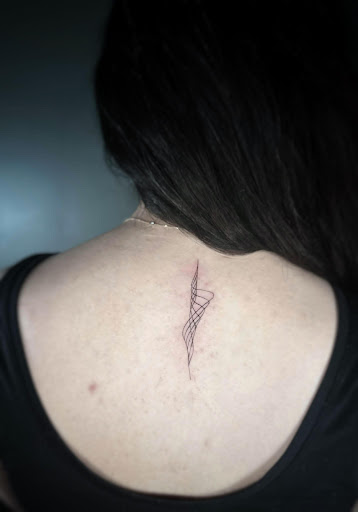 Find family meaning tattoo ideas for your next unique tattoo in Washington at Trilogy Atelier - DC Tattoo Shop Piercing Studio