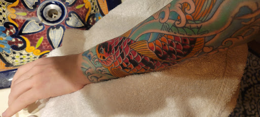 Explore lovers tattoo ideas, creative tattoo ideas in Edgewood, available at Wild Coyote Tattoo