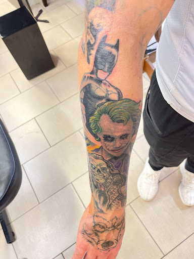 Explore nice arm tattoo ideas, creative tattoo ideas in Sarasota, available at SEVEN SINS Tattoo Studio