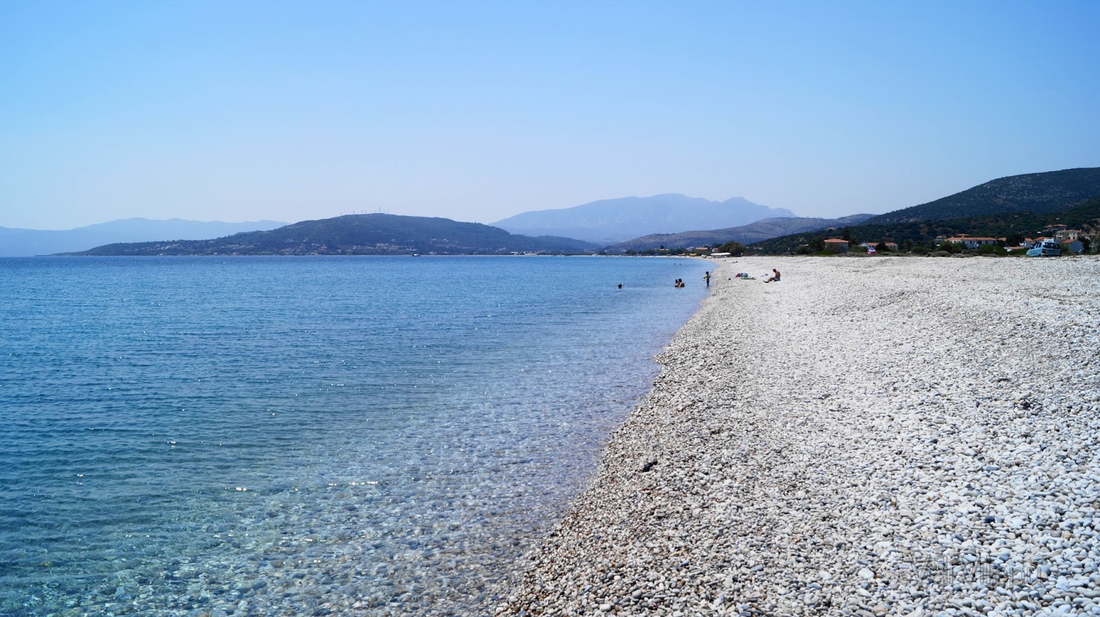 Photo of Mykali beach with long straight shore