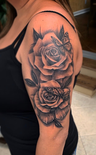 Explore hairdresser tattoo ideas, creative tattoo ideas in Bloomfield, available at Tattoo Garage