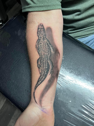 Explore mens thumb tattoo ideas, creative tattoo ideas in Warner Robins, available at Untold Pain Tattoo Studio