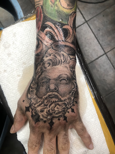 Explore half moon tattoo ideas, creative tattoo ideas in Omaha, available at Revolution Studios tattoo