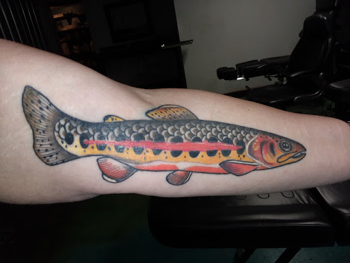 Explore ocean tattoo ideas for females, creative tattoo ideas in Williston, available at Badlands Tattoo And Piercing