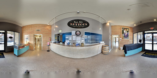 Explore cover up tattoo ideas lower back, creative tattoo ideas in Clarksville, available at Uncle Bobs Tattoos