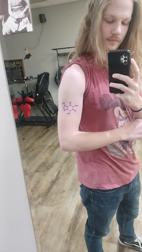 Explore libra tattoo ideas for men, creative tattoo ideas in Omaha, available at Ironwood Ink