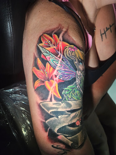 Explore forearm tattoo name ideas, creative tattoo ideas in Angola, available at Hoodlum Ink