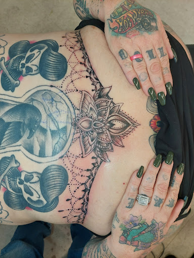 Explore tattoo thigh ideas, creative tattoo ideas in Fort Mohave, available at RedRum Tattoo & Body Piercing Co.
