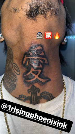 Explore dainty spine tattoo ideas, creative tattoo ideas in Jamaica, available at Rising Phoenix Ink