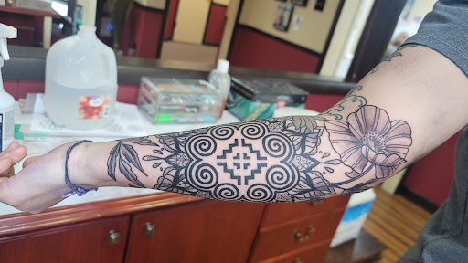 Explore tattoo ideas for music lovers, creative tattoo ideas in Green Bay, available at Skinny Buddha Tattoo