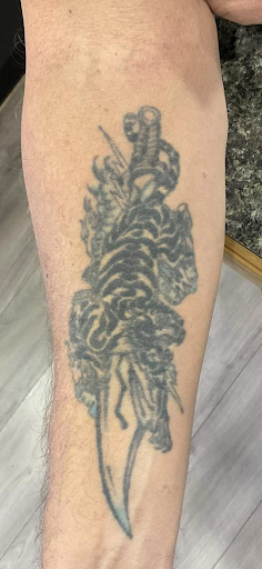Explore cursive tattoo ideas, creative tattoo ideas in Altoona, available at Catharsis Tattoo Gallery