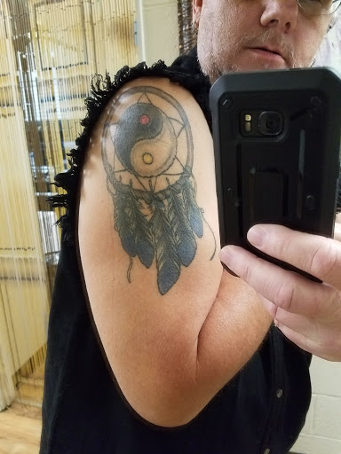 Explore archangel michael tattoo ideas, creative tattoo ideas in Russellville, available at Tried and True Tattoo Company