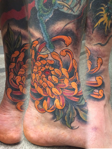 Explore neck tattoo ideas for women, creative tattoo ideas in New Kensington, available at BLUE HERMIT TATTOO