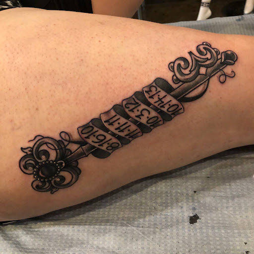 Find tattoo ideas between breast for your next unique tattoo in Wilkes Barre at South Main Street Tattoo